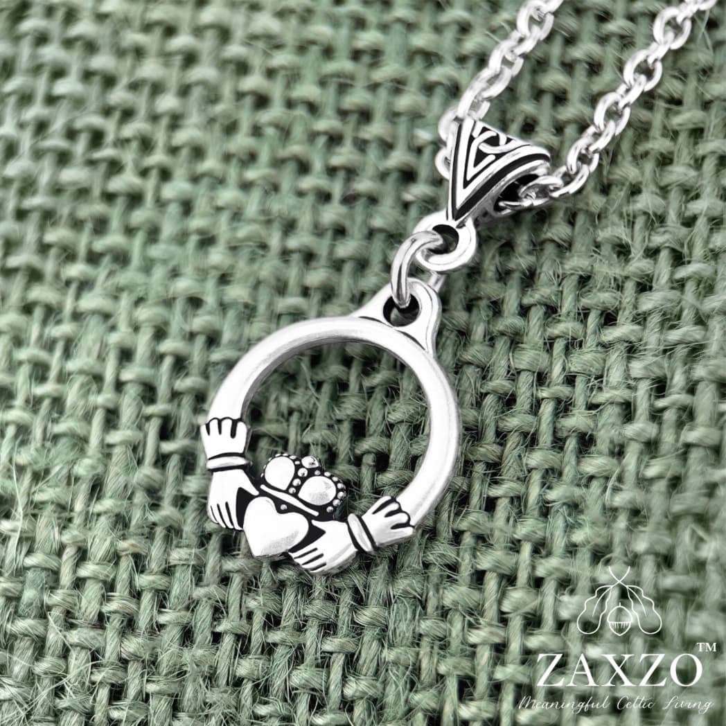 Irish silver Claddagh charm necklace on Trinity bail