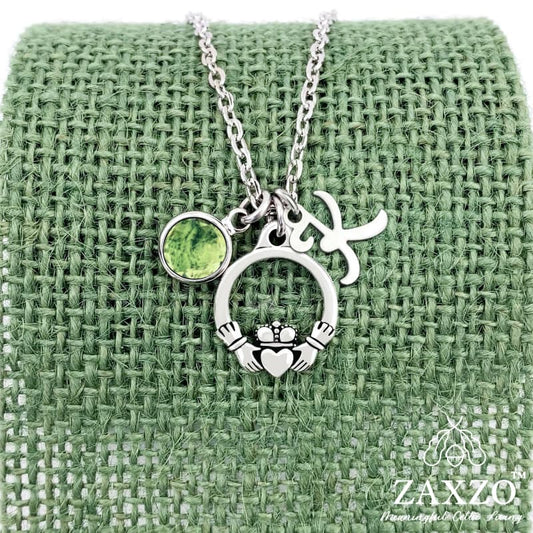 Personalized silver Irish Claddagh necklace with August birthstone and letter