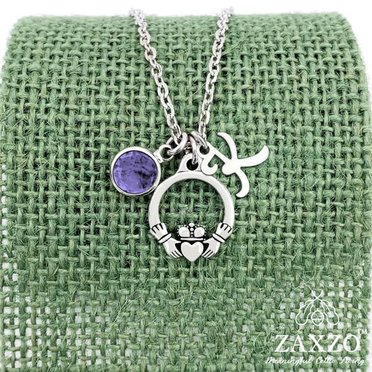 Personalized silver Irish Claddagh necklace with February birthstone and letter