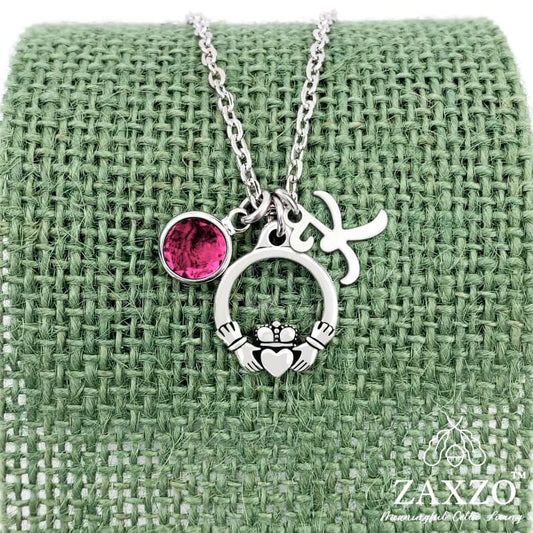 Personalized silver Irish Claddagh necklace with July birthstone and letter