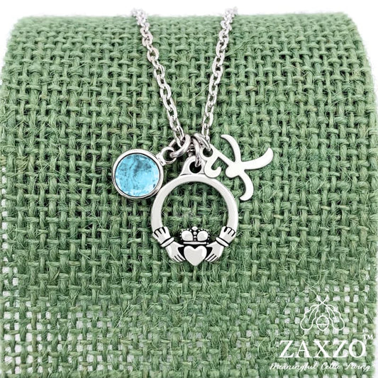 Personalized silver Irish Claddagh necklace with March birthstone and letter