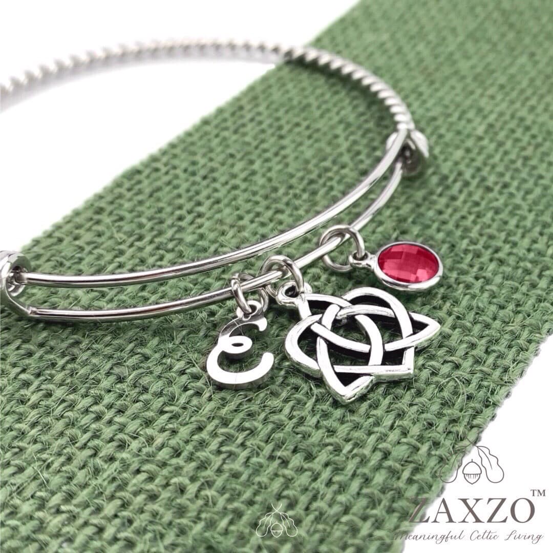 Sister knot bangle with July birthstone and choice of letter.