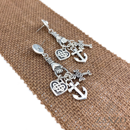 Heavy larger post earrings with a hand holding cross, anchor and Celtic heart