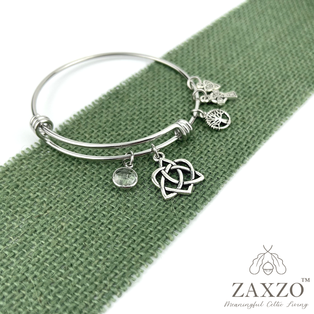 Bangle with optional birthstone and sister knot charm and side charms