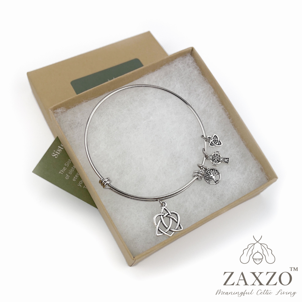 Celtic sister knot bangle with side charms boxed