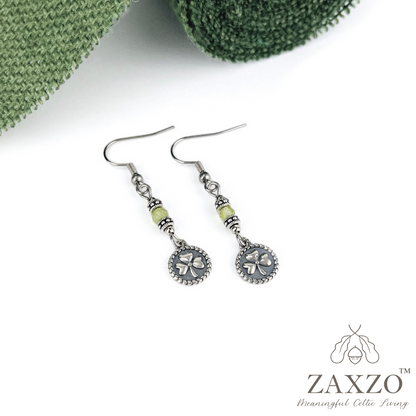 Dainty sterling silver shamrock charm earrings with peridot