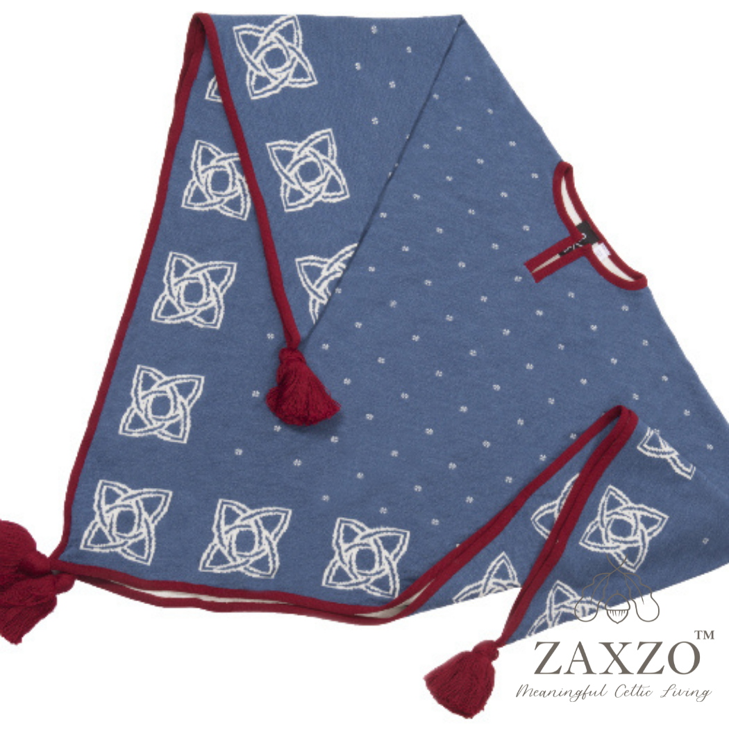 Lay flat America poncho in denim blue with winter white contrast pattern and red trim shown from side