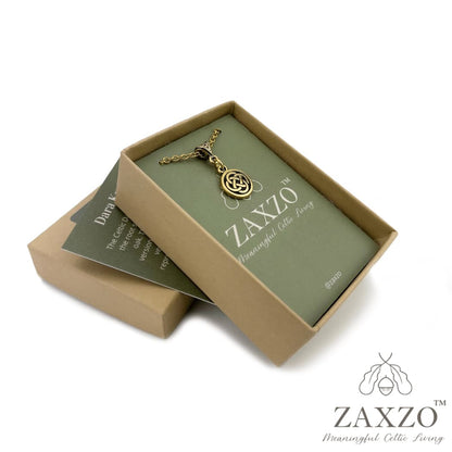 Small Celtic gold Dara knot necklace shown in open jewelry gift box